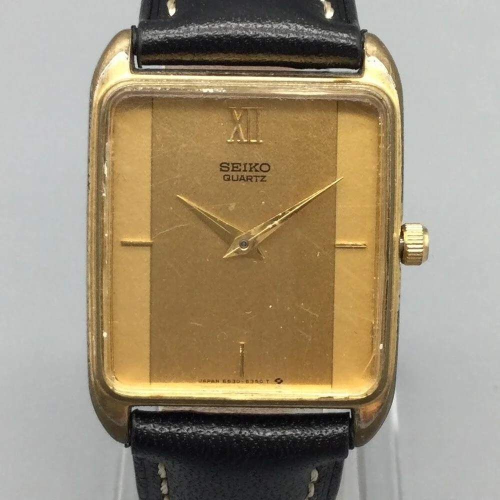 Seiko Mens Watch 25mm Gold Dial Gold Tone 6530-5200 Black Strap New Battery